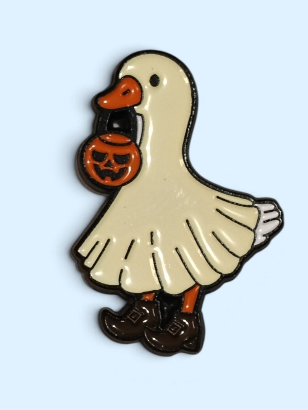 Cream Goose Trick-or-Treat Enamel Pin with Orange Pumpkin